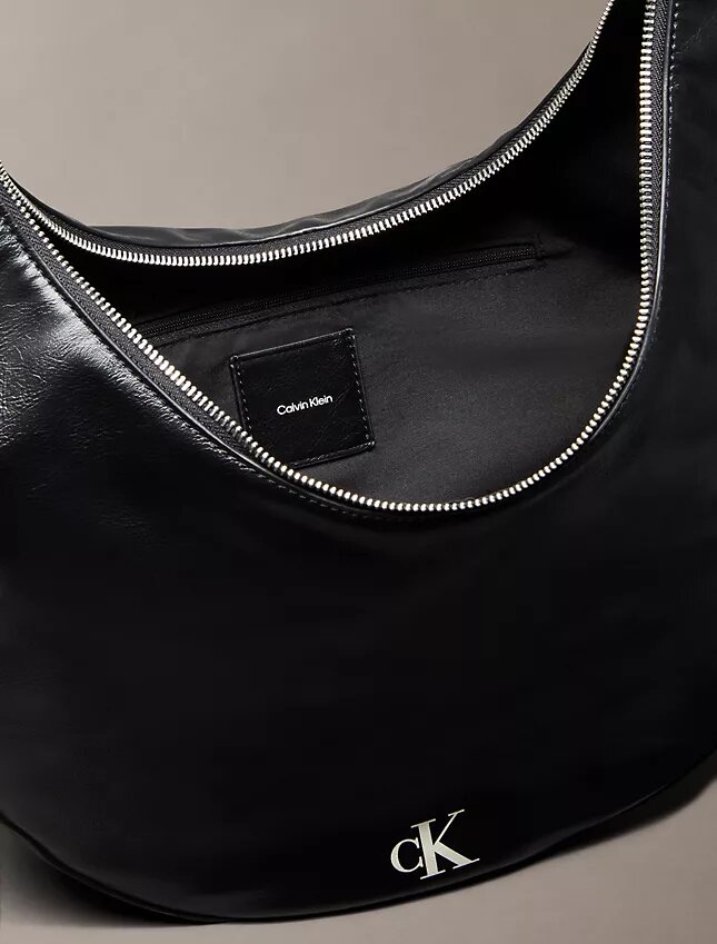 Bolso bandolera convertible con forma curvada Bolso bandolera convertible con forma curvada