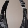 Bolso bandolera convertible con forma curvada Bolso bandolera convertible con forma curvada