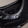 Bolso cruzado pequeño curvo Bolso cruzado pequeño curvo