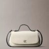 Bolso de hombro con asa de lona Monogram Bolso de hombro con asa de lona Monogram