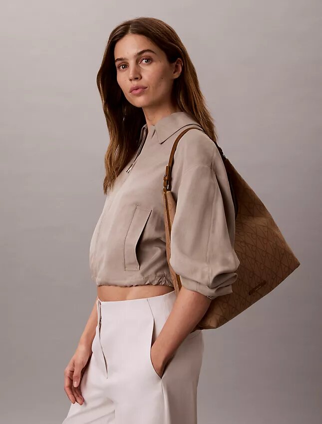 Bolso de hombro de jacquard con emblema Bolso de hombro de jacquard con emblema