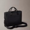 Bolso de viaje con monograma en relieve Bolso de viaje con monograma en relieve
