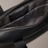 Bolso de viaje con monograma en relieve Bolso de viaje con monograma en relieve