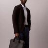 Bolso de viaje con monograma en relieve Bolso de viaje con monograma en relieve