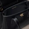 Bolso mini tote con bandolera Monogram Bolso mini tote con bandolera Monogram