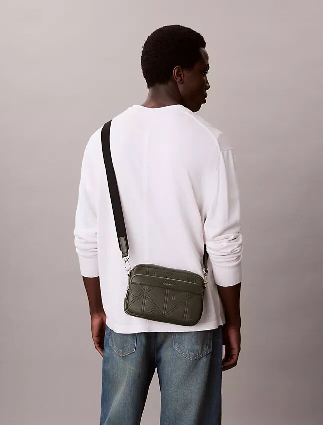 Bolso para cámara con logotipo en relieve por toda la superficie Bolso para cámara con logotipo en relieve por toda la superficie