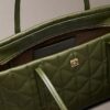 Bolso pequeño acolchado con logotipo Bolso pequeño acolchado con logotipo