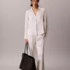 Bolso tote grande con logotipo en todo el diseño y bolsillo Bolso tote grande con logotipo en todo el diseño y bolsillo