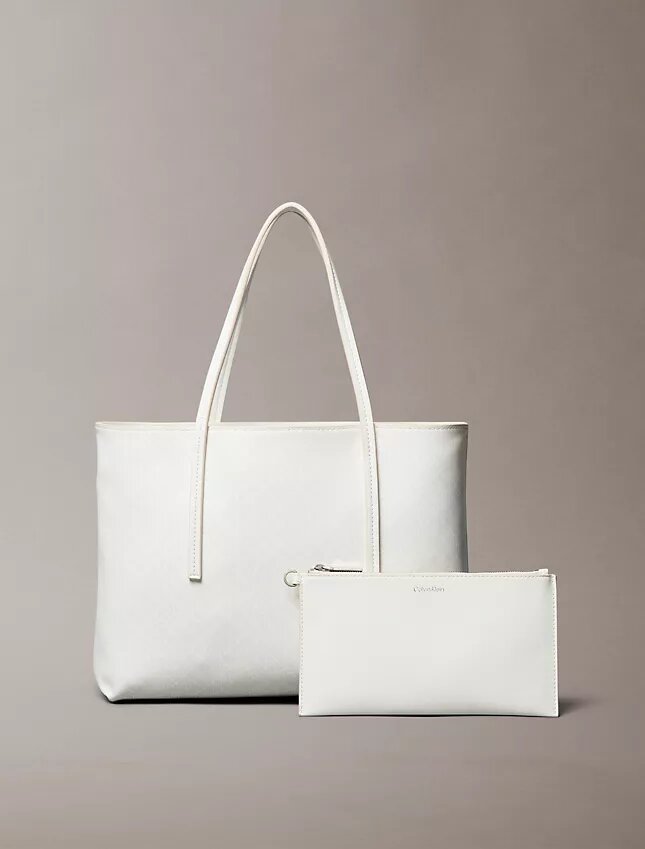 Bolso tote pequeño con estampado del logotipo en todo el diseño y bolsillo Bolso tote pequeño con estampado del logotipo en todo el diseño y bolsillo