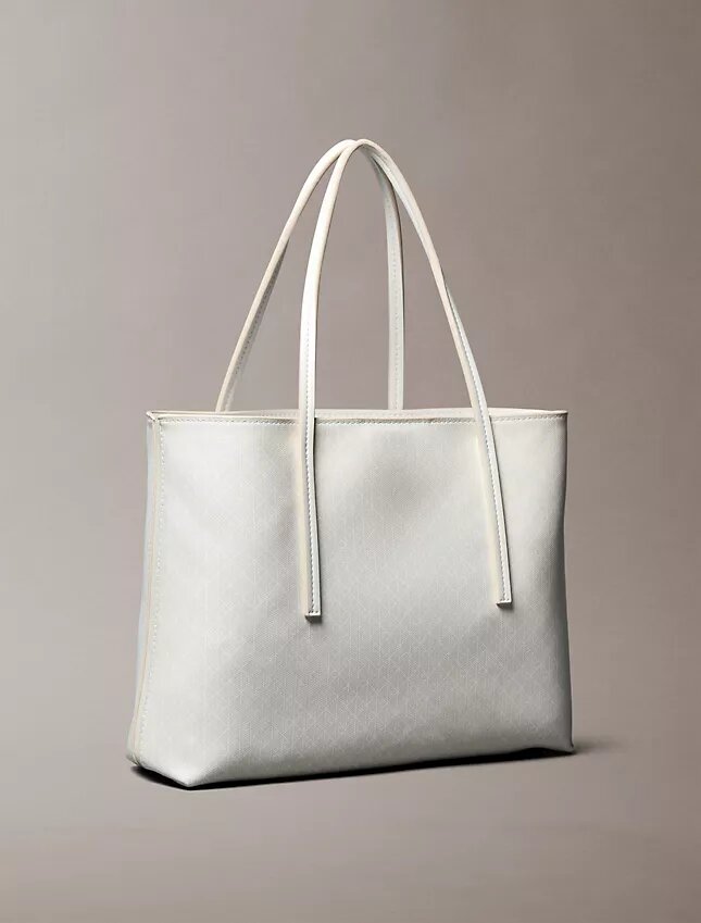 Bolso tote pequeño con estampado del logotipo en todo el diseño y bolsillo Bolso tote pequeño con estampado del logotipo en todo el diseño y bolsillo