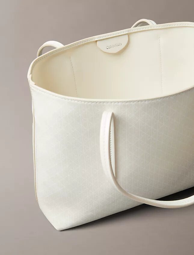 Bolso tote pequeño con estampado del logotipo en todo el diseño y bolsillo Bolso tote pequeño con estampado del logotipo en todo el diseño y bolsillo