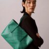Bolso tote pequeño con estampado del logotipo en todo el diseño y bolsillo Bolso tote pequeño con estampado del logotipo en todo el diseño y bolsillo