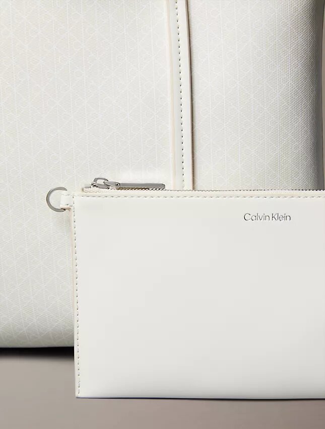 Bolso tote pequeño con estampado del logotipo en todo el diseño y bolsillo Bolso tote pequeño con estampado del logotipo en todo el diseño y bolsillo