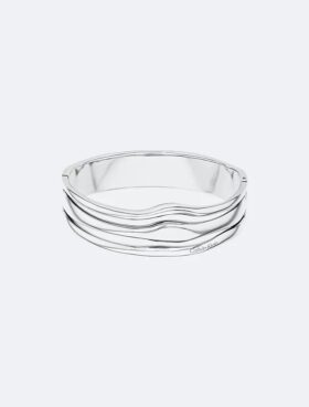 Brazalete con bisagra de forma fluida y escultural Brazalete con bisagra de forma fluida y escultural