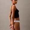 Calzoncillos Thong modernos Calvin Klein 1996 de Cotton Stretch, paquete de 7 Calzoncillos Thong modernos Calvin Klein 1996 de Cotton Stretch, paquete de 7