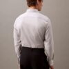 Camisa ajustada con botones y tejido elástico Camisa ajustada con botones y tejido elástico