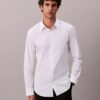 Camisa ajustada elástica con botones Camisa ajustada elástica con botones