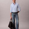Camisa ajustada elástica con botones Camisa ajustada elástica con botones