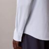 Camisa ajustada elástica con botones Camisa ajustada elástica con botones