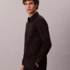 Camisa ajustada elástica con botones Camisa ajustada elástica con botones