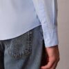 Camisa ajustada elástica con botones Camisa ajustada elástica con botones