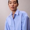 Camisa corta de popelín con botones y corte holgado