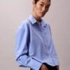 Camisa corta de popelín con botones y corte holgado