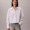 Camisa corta holgada de popelín con botones Camisa corta holgada de popelín con botones