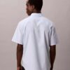 Camisa de algodón elástico a rayas, de manga corta y con botones Camisa de algodón elástico a rayas, de manga corta y con botones