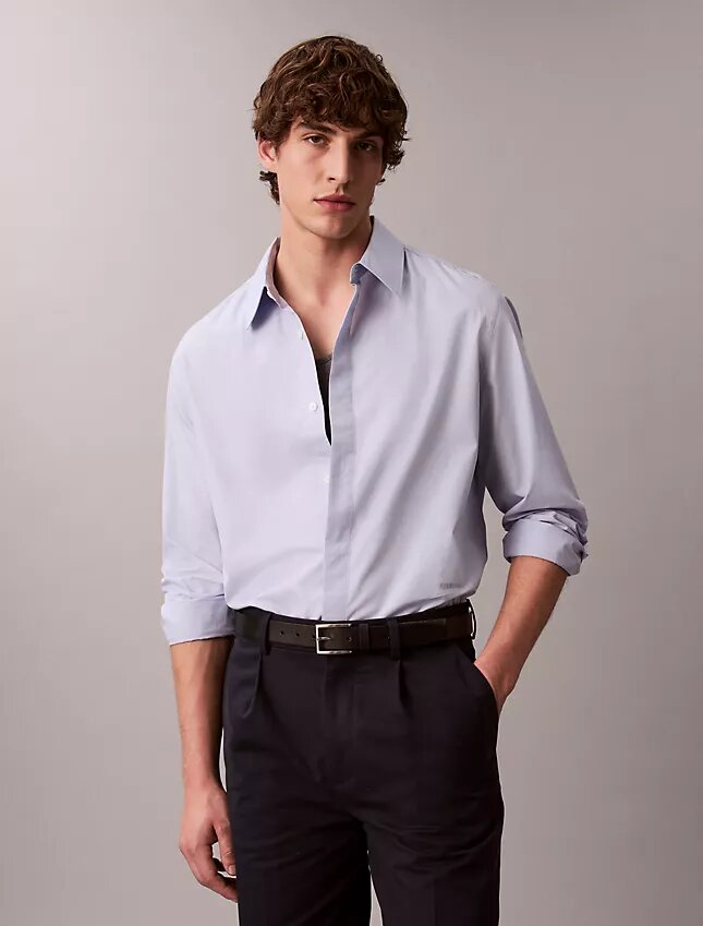 Camisa de algodón lisa de corte holgado con botones Camisa de algodón lisa de corte holgado con botones