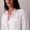 Camisa de lyocell con solapa enrollada y botones Camisa de lyocell con solapa enrollada y botones