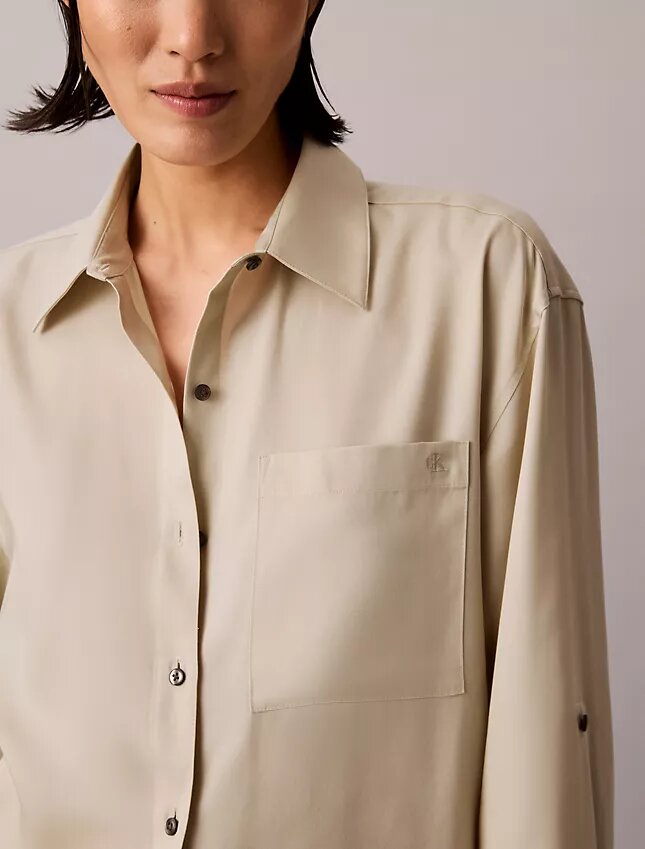Camisa de lyocell con solapa enrollada y botones Camisa de lyocell con solapa enrollada y botones