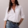 Camisa de lyocell con solapa enrollada y botones Camisa de lyocell con solapa enrollada y botones