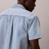 Camisa de mezclilla utilitaria con botones Camisa de mezclilla utilitaria con botones