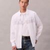 Camisa de popelín con estampado gráfico y botones, corte holgado Camisa de popelín con estampado gráfico y botones, corte holgado