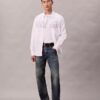 Camisa de popelín con estampado gráfico y botones, corte holgado Camisa de popelín con estampado gráfico y botones, corte holgado