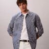 Camisa de popelín lavado a rayas con botones Camisa de popelín lavado a rayas con botones