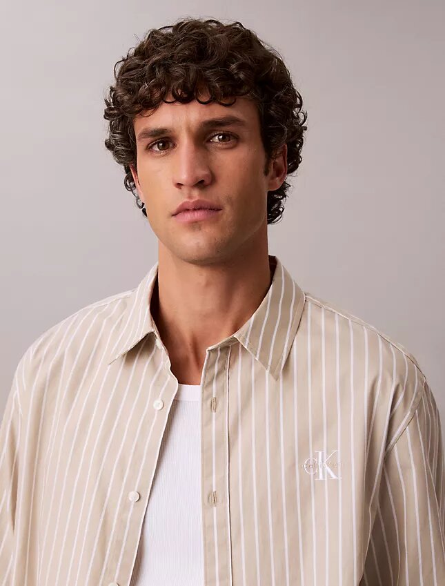 Camisa de popelín lavado a rayas con botones Camisa de popelín lavado a rayas con botones