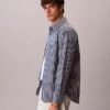 Camisa de popelín lavado a rayas con botones Camisa de popelín lavado a rayas con botones