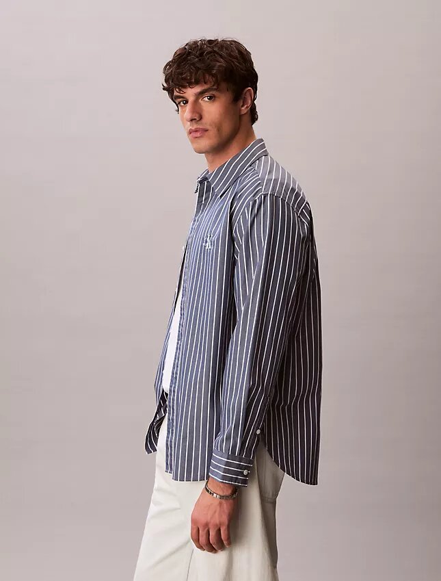 Camisa de popelín lavado a rayas con botones Camisa de popelín lavado a rayas con botones