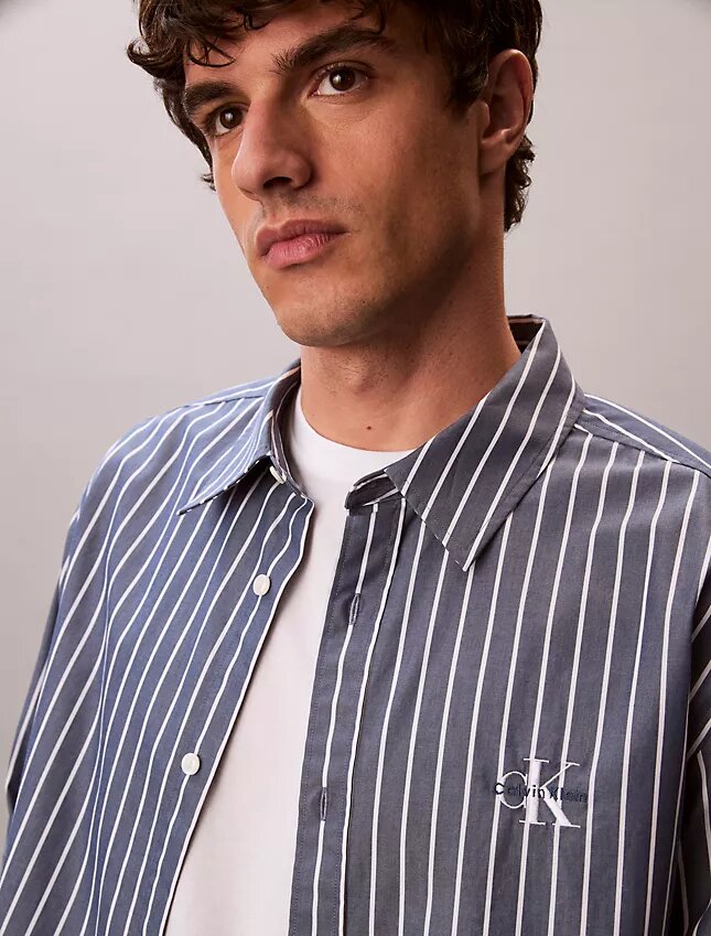 Camisa de popelín lavado a rayas con botones Camisa de popelín lavado a rayas con botones