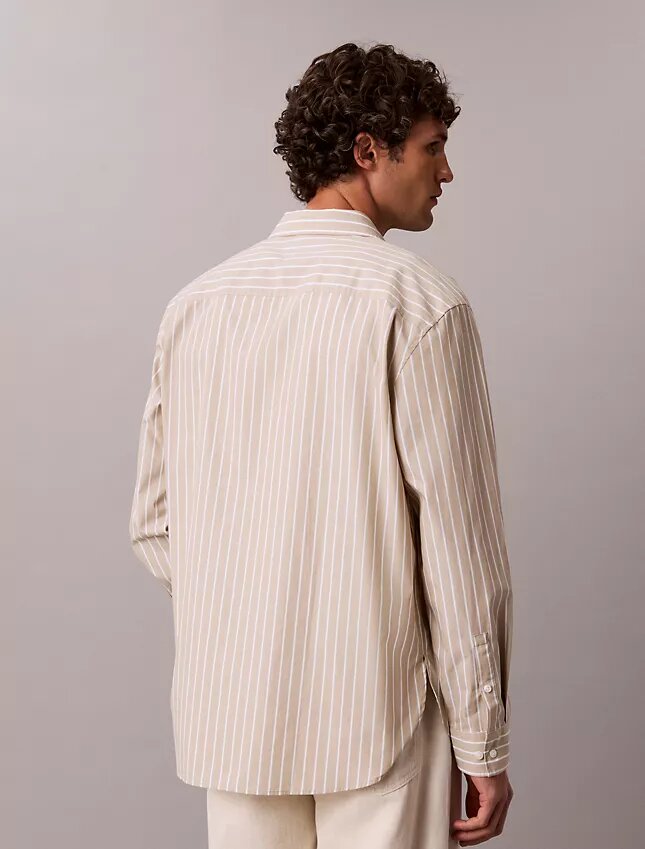 Camisa de popelín lavado a rayas con botones Camisa de popelín lavado a rayas con botones