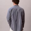 Camisa de popelín lavado a rayas con botones Camisa de popelín lavado a rayas con botones