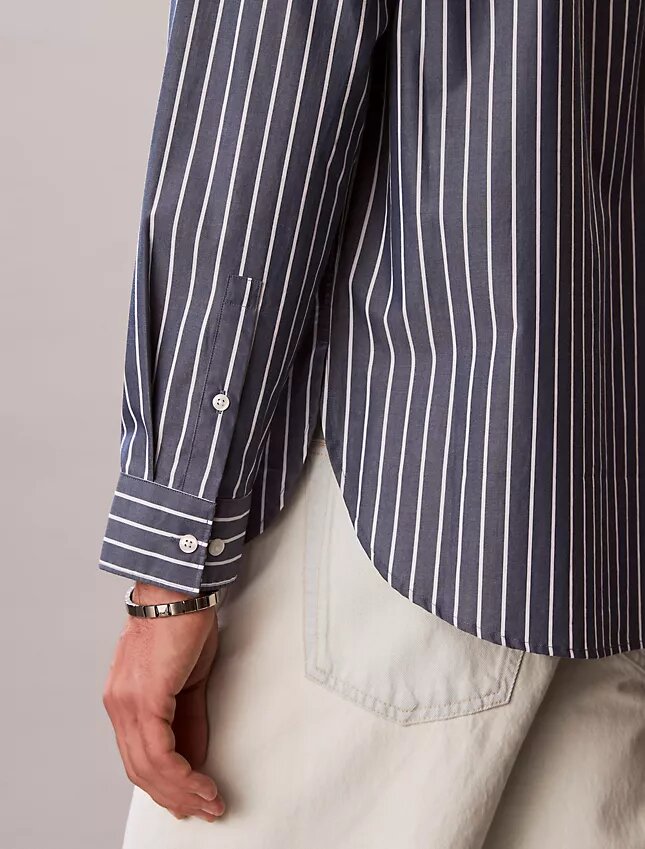 Camisa de popelín lavado a rayas con botones Camisa de popelín lavado a rayas con botones