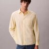 Camisa de popelín lavado con botones y corte holgado