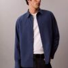 Camisa de popelín lavado con botones y corte holgado Camisa de popelín lavado con botones y corte holgado