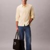 Camisa de popelín lavado con botones y corte holgado