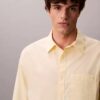Camisa de popelín lavado con botones y corte holgado