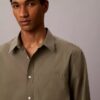 Camisa de popelín lavado con botones y corte holgado Camisa de popelín lavado con botones y corte holgado