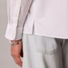 Camisa de popelín lavado con botones y corte holgado Camisa de popelín lavado con botones y corte holgado